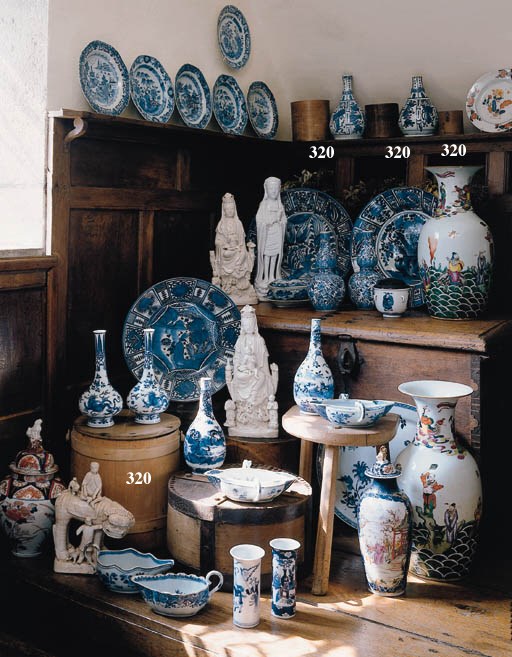 A collection of six bentwood and wrought-iron grain measures