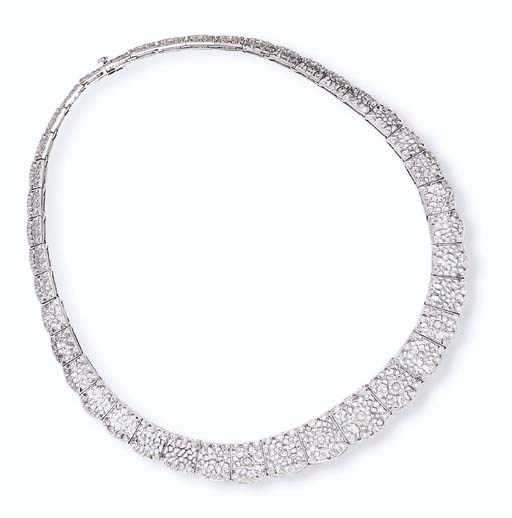 AN 18K WHITE GOLD AND DIAMOND NECKLACE, BY MIKIMOTO