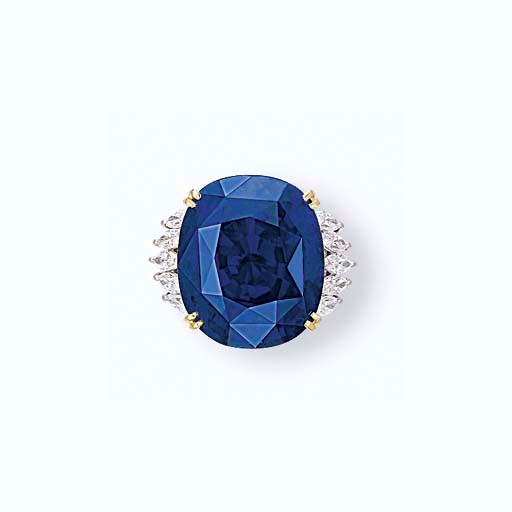 A SAPPHIRE AND DIAMOND RING