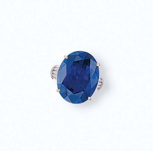 A SAPPHIRE AND DIAMOND RING