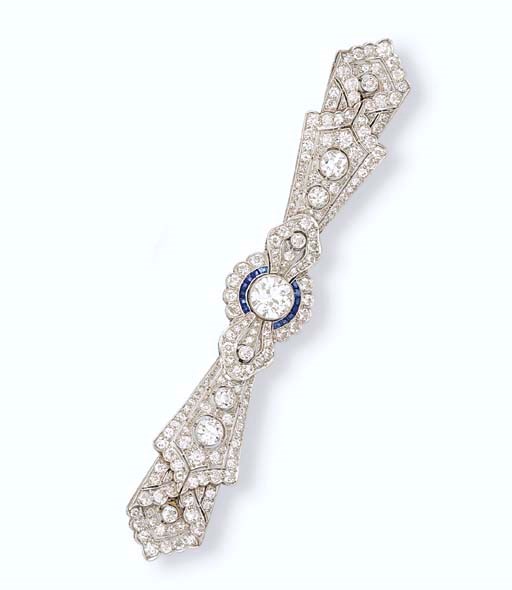 A DIAMOND AND SAPPHIRE BROOCH