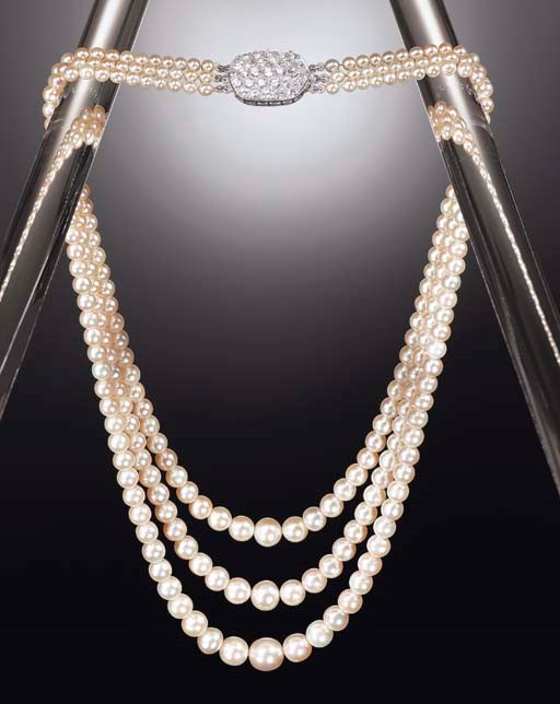 AN IMPORTANT THREE-STRAND NATURAL PEARL AND DIAMOND NECKLACE