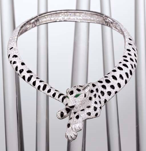 AN IMPORTANT DIAMOND AND ONYX "PANTHER" NECKLACE, BY CARTIER
