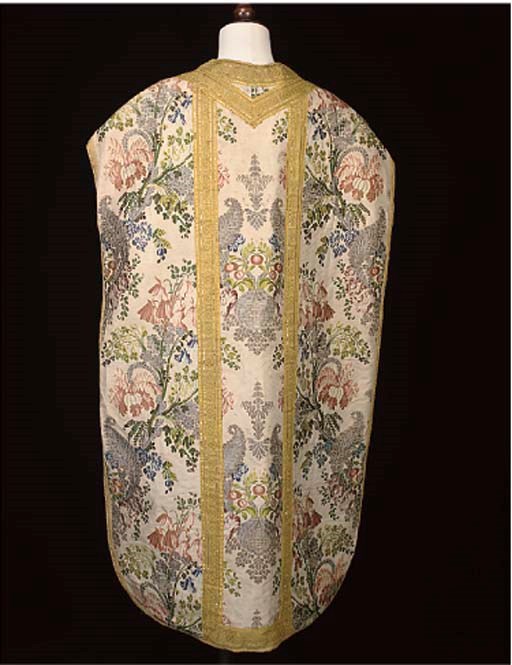 A CHASUBLE, VEIL, STOLE AND MANIPLE SET; AND TWO FURTHER CHASUBLES