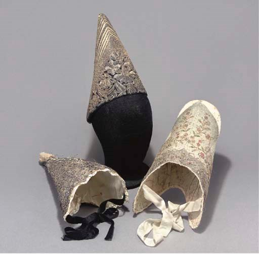 THREE CONTINENTAL BONNETS AND A COLLECTION OF TEXTILES