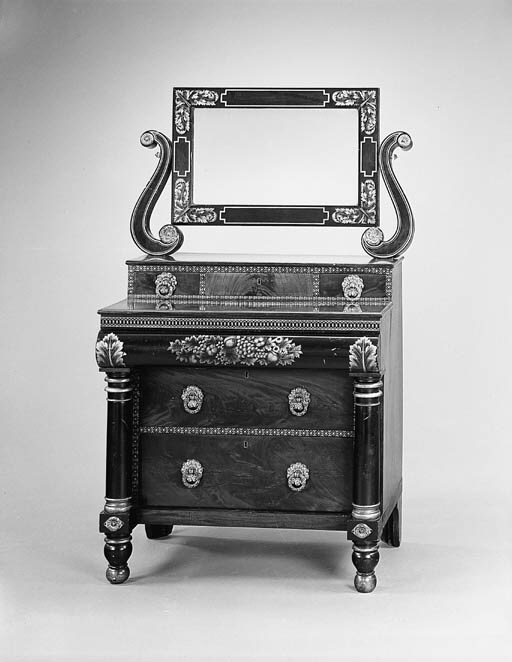 A CLASSICAL PARCEL-EBONIZED AND STENCILLED MAHOGANY DRESSING BUREAU