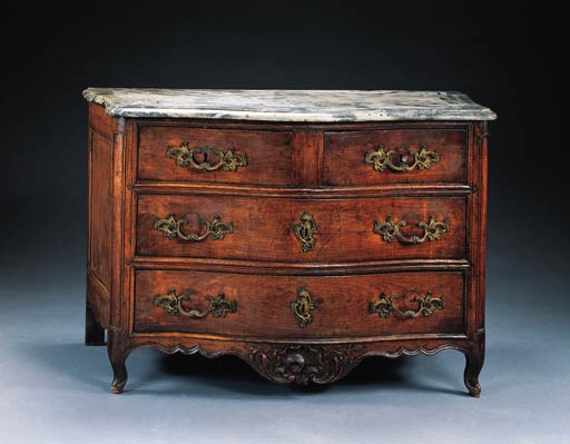 A LOUIS XV WALNUT COMMODE