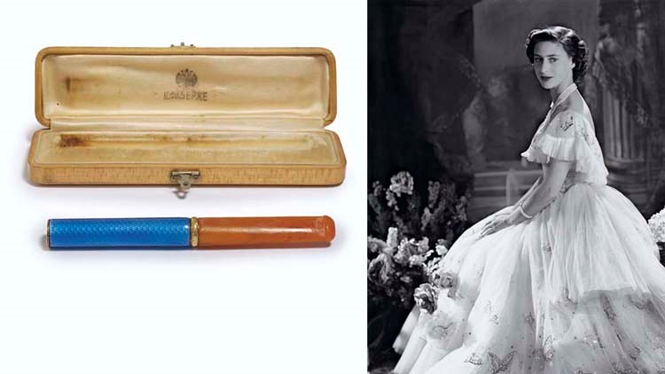 A RUSSIAN TWO-COLOUR GOLD-MOUNTED GUILLOCHÉ ENAMELLED AND AMBER CIGARETTE-HOLDER