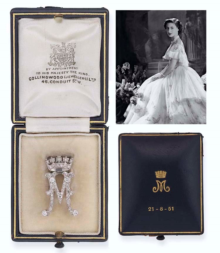 A DIAMOND MONOGRAM BROOCH