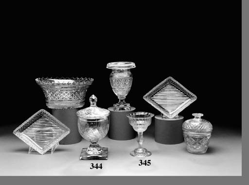 AN ENGLISH FACETED-STEMMED CHAMPAGNE-GLASS