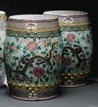 A PAIR OF BLUE GROUND FAMILLE ROSE GARDEN SEATS