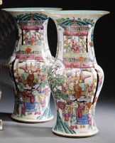 A PAIR OF 'CANTON FAMILLE ROSE' VASES