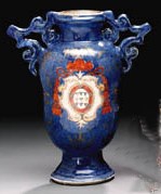 A TWO-HANDLED ARMORIAL VASE