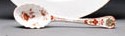 A RARE IRON-RED AND GILT FLUTED SPOON
