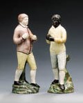 A PAIR OF STAFFORDSHIRE PEARLWARE FIGURES OF PUGILISTS CRIBB AND MOLYNEUX