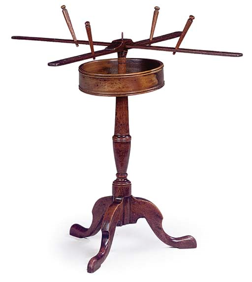 A MAHOGANY WOOL WINDER TABLE
