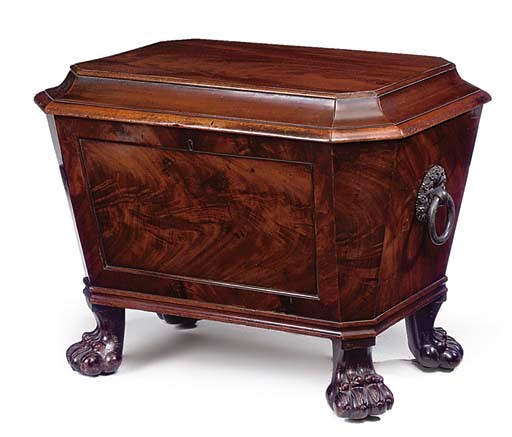 A REGENCY MAHOGANY SARCOPHAGUS-SHAPED CELLARETTE