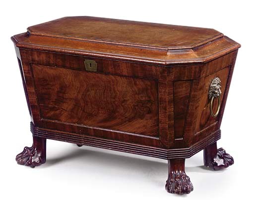 A REGENCY MAHOGANY SARCOPHAGUS-SHAPED CELLARETTE