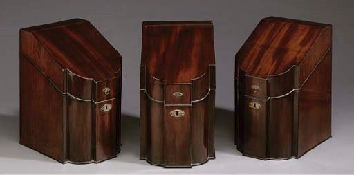 A SET OF THREE GEORGE III MAHOGANY AND EBONY STRUNG KNIFE BOXES