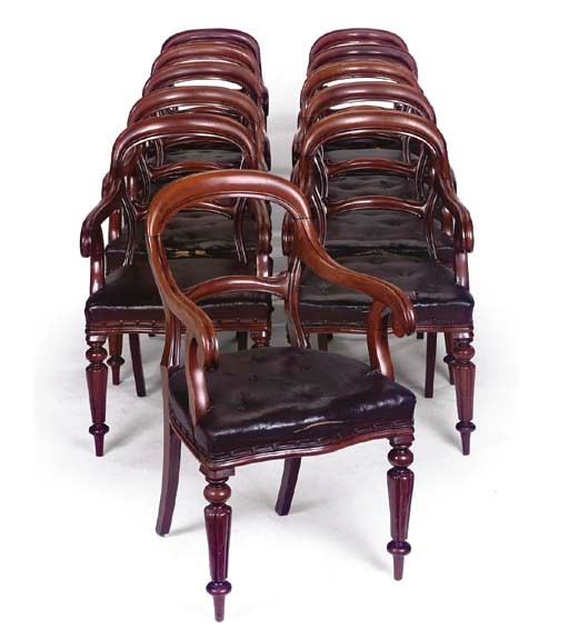 A SET OF ELEVEN VICTORIAN MAHOGANY ARMCHAIRS