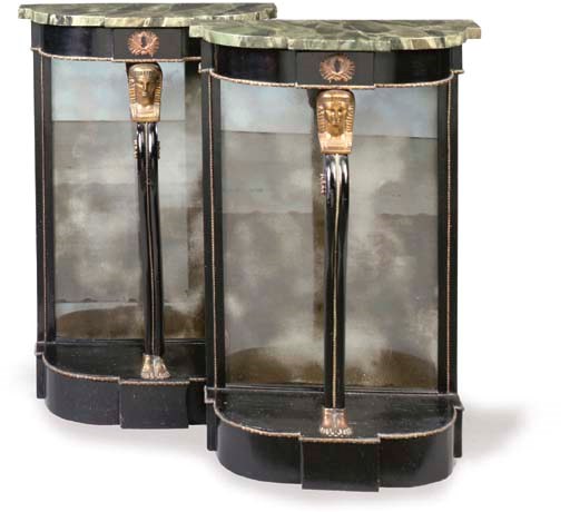 A PAIR OF REGENCY REVIVAL GILT-METAL-MOUNTED EBONISED CONSOLE TABLES