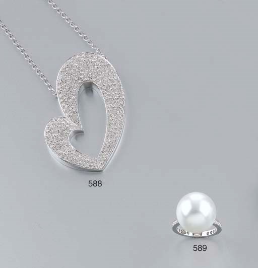 ANELLO IN ORO CON PERLA AUSTRALIANA COLTIVATA E BRILLANTI