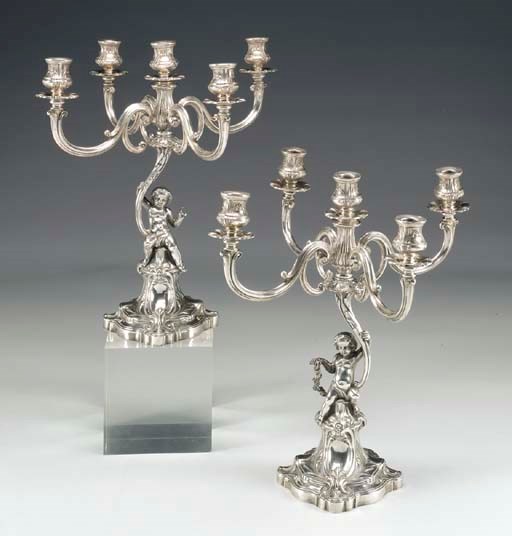 COPPIA DI CANDELABRI IN ARGENTO