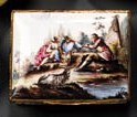 AN ENGLISH COPPER-GILT MOUNTED ENAMEL RECTANGULAR SNUFF-BOX AND COVER
