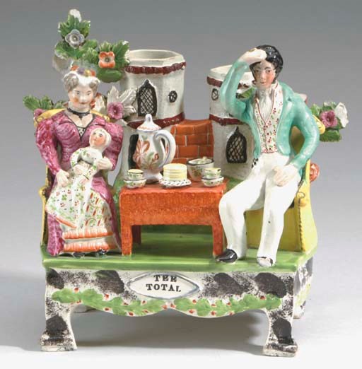A STAFFORDSHIRE POTTERY FIGURE GROUP,