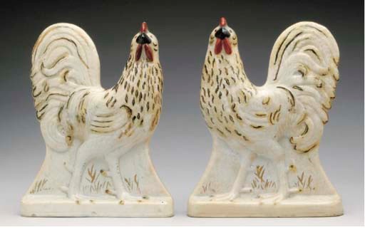 A PAIR OF STAFFORDSHIRE MODELS OF ROOSTERS,