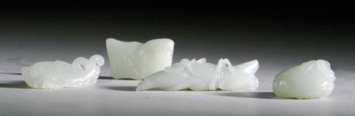 FOUR CHINESE WHITE JADE PENDANTS,