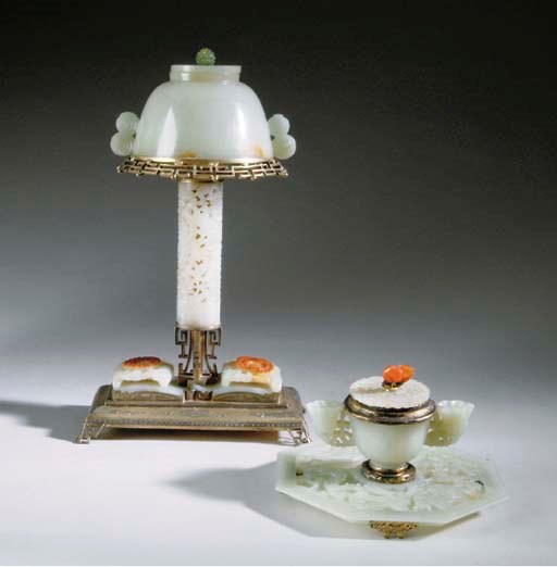 A GILT MOUNTED CHINESE WHITE AND RUSSET JADE LAMP AND A GILT MOUNTED WHITE JADE INKSTAND,