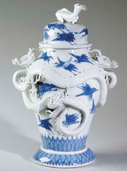 A JAPANESE HIRADO WARE BLUE AND WHITE JAR AND COVER,