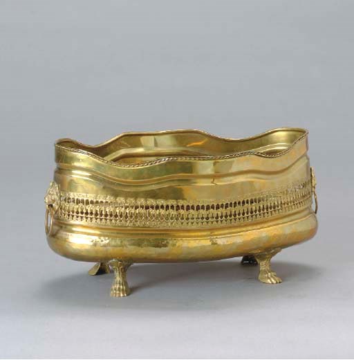 A PIERCED BRASS LOW BASKET,