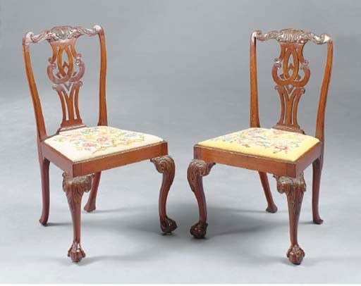 A PAIR OF GEORGE II STYLE WALNUT SIDE CHAIRS,