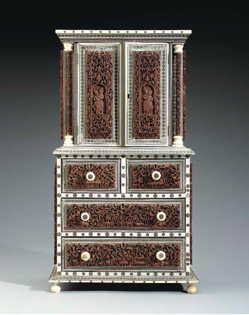 AN ANGLO-INDIAN INLAID IVORY AND HARDWOOD MINIATURE CABINET-ON-CHEST,**