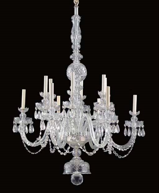 A GEORGE III STYLE CUT GLASS TWELVE LIGHT CHANDELIER,