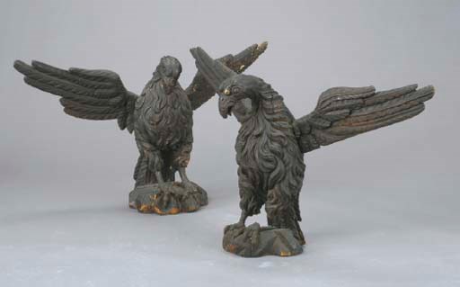 A PAIR OF STAINED WOOD MODELS OF EAGLES,
