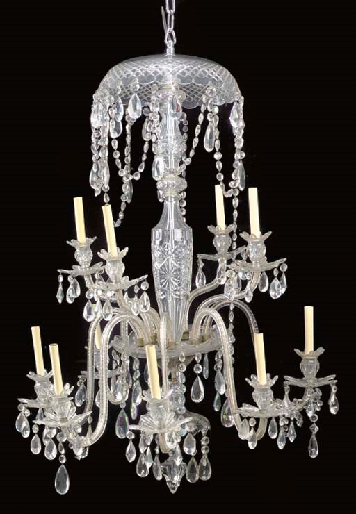 A GEORGE III STYLE CUT-GLASS TWELVE LIGHT CHANDELIER,