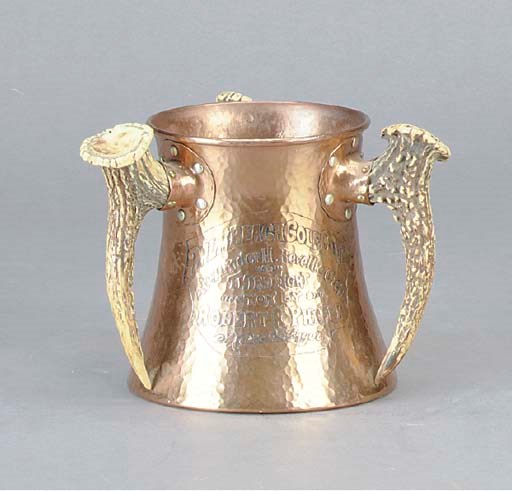 AN ENGRAVED COPPER AND HORN PRESENTATION CUP,