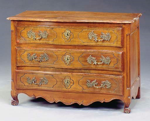 A PROVINCIAL LOUIS XV WALNUT COMMODE,
