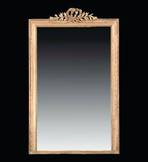 A LOUIS XVI STYLE GILTWOOD MIRROR,