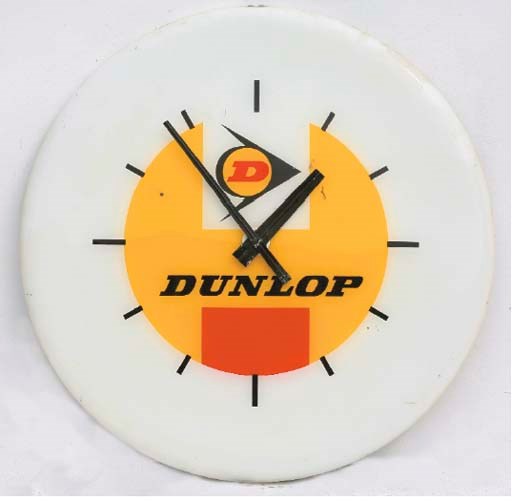 Dunlop - A large advertising showroom clock; circular format, modern electrical movement; c.1980s.