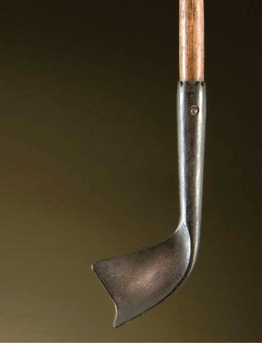 A MINATURE SQUARE TOE IRON