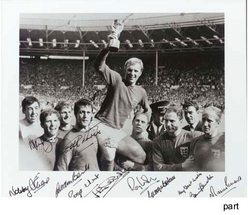 A BLACK AND WHITE PHOTOGRAPH OF VICTORIOUS 1966 WORLD CUP-WINNING SIDE