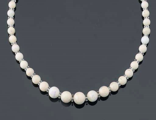 AN OPAL BEAD AND QUARTZ NECKLACE