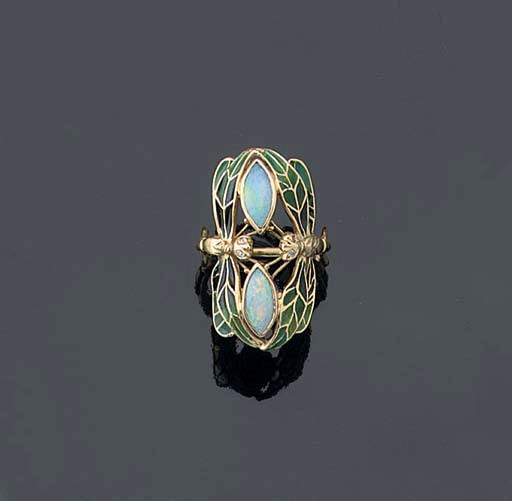AN ENAMEL AND OPAL RING