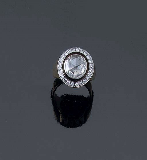 A ROSE-CUT DIAMOND CLUSTER RING