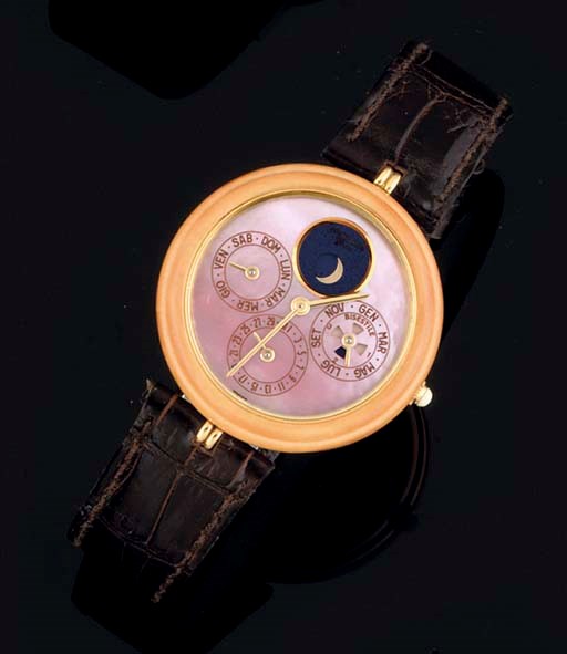 Gerald Genta. An 18ct Gold and yellow Hard Stone Automatic Perpetual wristwatch with mother of pearl dial