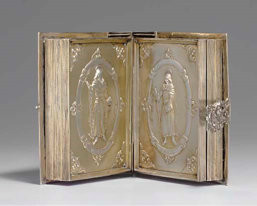 [SILVER BOOK.] Continental embossed silver binding, with six embossed silver panels of the twelve apostles. 19th century.